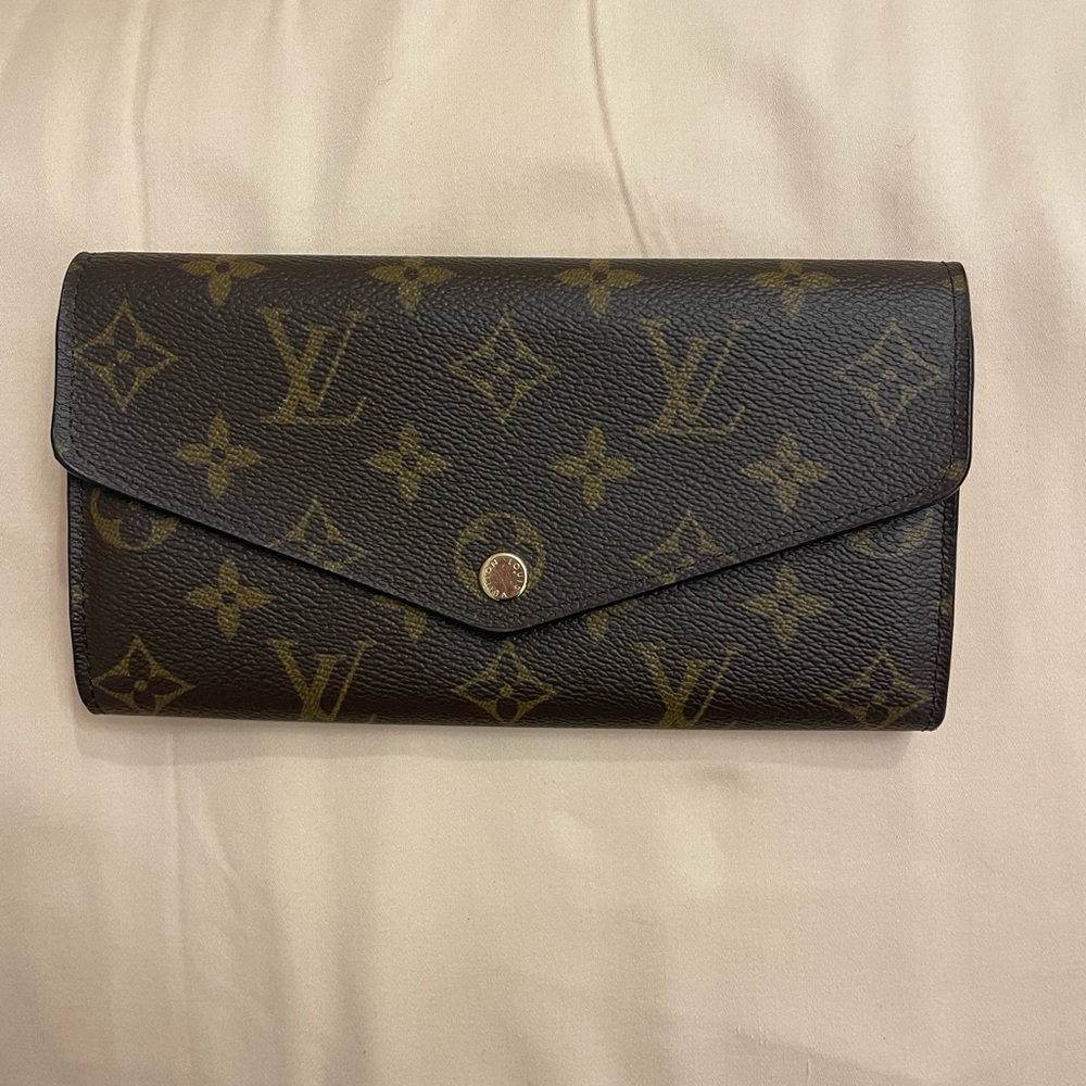Brand new Louis Vuitton wallet, brown and red combination colors.